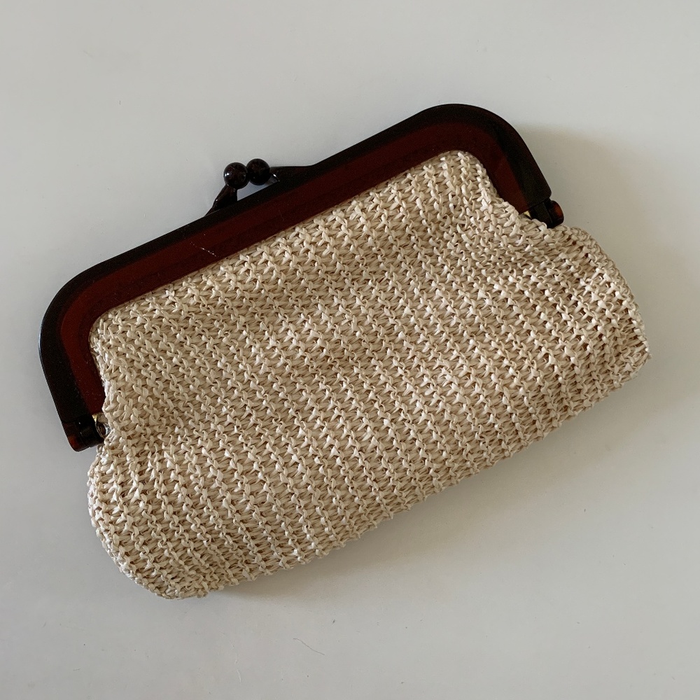 Woven clutch with lucite handle